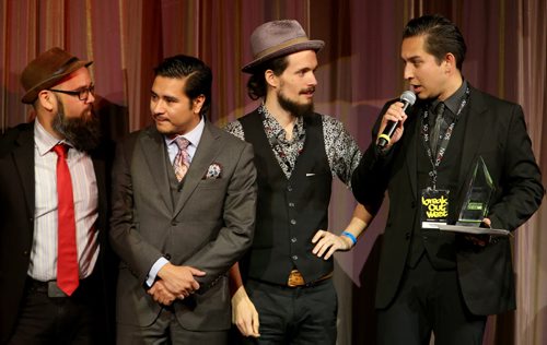 Winnipeg's Mariachi Ghost accepts the award for World Recording of the Year at the Western Canadian Music Awards, being held at Club Regent Casino, Sunday, October 5, 2014. (TREVOR HAGAN/WINNIPEG FREE PRESS)