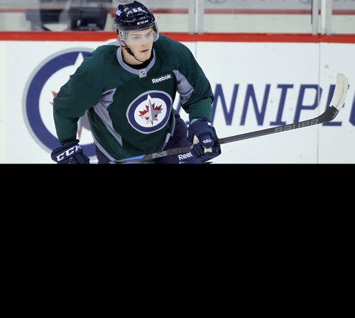 Winnipeg Jets #56 Adam Lowry in green in practice this morning at the MTS Centre. BORIS MINKEVICH / WINNIPEG FREE PRESS  Oct. 6, 2014