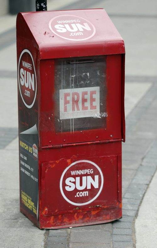In pic Wpg Sun paper box .Quebecor sell it's English speaking paper to Postmedia  for $316 million , this includes the Wpg Sun . to Oct. 6 2014 / KEN GIGLIOTTI / WINNIPEG FREE PRESS