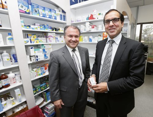 BIZ - Positive Health Pharmacy - Kirbyson story: (not in photo)  David Asper heading up a local group that's getting into the pharmacy business.In photo  (right) CEO Dalbir Bains and  (left) COO Don Vavro  at the Positive Health Pharmacy at 3556 Pembina .Ä®Oct. 7 2014 / KEN GIGLIOTTI / WINNIPEG FREE PRESS