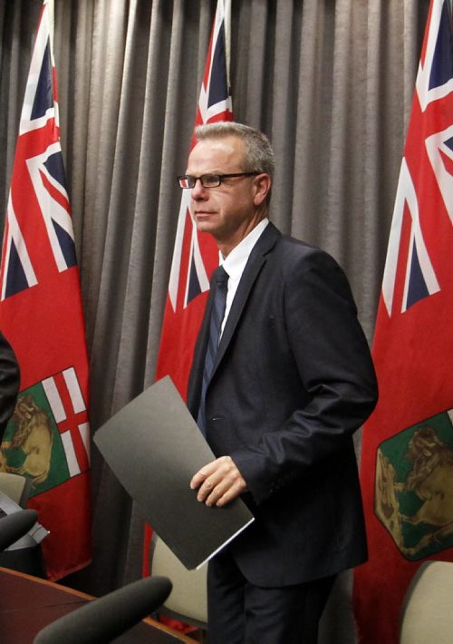 Advanced Learning Minister James Allum arrivies at a news conference  re: Closing the Achievement Gap:Success for Every Student, an action plan in response to Pan-Canadian Assessment Program. Nick Martin Wayne Glowacki/Winnipeg Free Press Oct. 7 2014