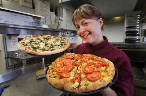 Diana Cline with her gourmet Pizzas at Diana's Cucina & Lounge, 730 St. Anne's Roadsee Dave Sanderson story- Oct 07, 2014   (JOE BRYKSA / WINNIPEG FREE PRESS)