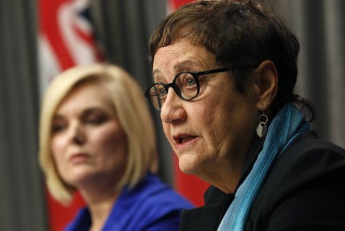 At right, Barbara Bruce, vice-president, AMR Planning and Consulting with Family Services Minister Kerri Irvin-Ross at news conference in the Manitoba Legislative Bld re: the  interim report on Hughes inquiry recommendations and new initiatives to protect children. Larry Kusch story Wayne Glowacki/Winnipeg Free Press Oct. 8 2014