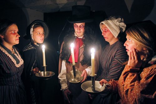 This Friday, Parks Canada will begin offering its annual Halloween program at Lower Fort Garry National Historic Site. Lower Fort Garry historical interpreters Jennifer Hooper, Jenna Dyck, Matthew Rothenberger, Laurie MacDonell, and Hayley Caldwell. All working at the Fright at the Fort halloween program that runs Oct. 10th,11th, 17th, 23rd, 24th, 25th, 30th, 31st. from 7-11pm. The theme of Fright at the Fort this year is an epidemic that sweeps the fort, in which visitors will be able to find scares and horrors, partake of a Victorian wake, encounter the terrifying Windigo and enjoy food and beverages at the Thirsty Beaver Tavern. BORIS MINKEVICH / WINNIPEG FREE PRESS October 8, 2014