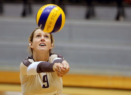 University of Manitoba Bisons' Brittany Habing bumps the ball during their game against the Calgary Dinos at Investors Group Athletic Centre, Thursday, October 9, 2014. (TREVOR HAGAN/WINNIPEG FREE PRESS)