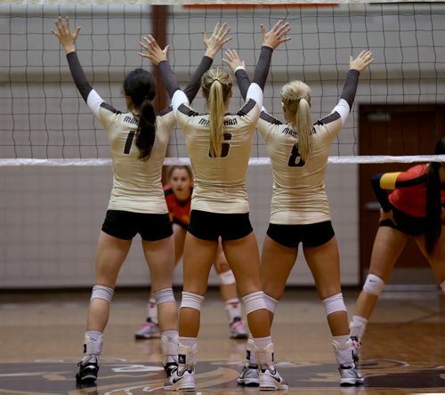 Three University of Manitoba Bisons' prepare between points during their game against the Calgary Dinos at Investors Group Athletic Centre, Thursday, October 9, 2014. (TREVOR HAGAN/WINNIPEG FREE PRESS) Sarah Klassen, Rachel Cockrell and #8 isn't on the roster. Sorry.