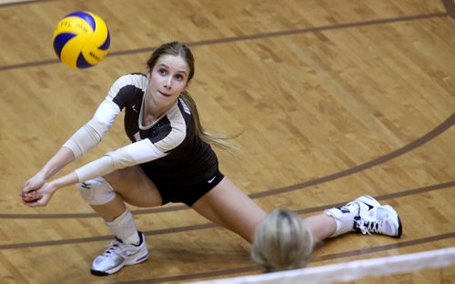 University of Manitoba Bisons' Clare Martens bumps the ball during their game against the Calgary Dinos at Investors Group Athletic Centre, Thursday, October 9, 2014. (TREVOR HAGAN/WINNIPEG FREE PRESS)