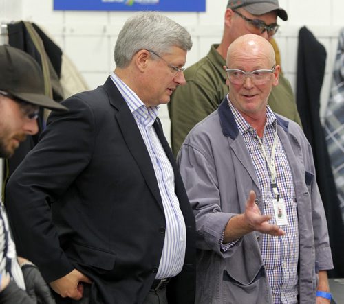 Prime Minister Stephen Harper at photo opportunity at Manitoba Institute of Trades and Technology  Henlow Campus, 130 Henlow Bay. He was joined by Dan Zvanovec, Millwright Instructor. BORIS MINKEVICH / WINNIPEG FREE PRESS October 10, 2014