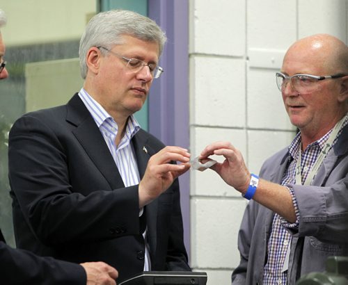 Prime Minister Stephen Harper at photo opportunity at Manitoba Institute of Trades and Technology  Henlow Campus, 130 Henlow Bay. He was joined by Dan Zvanovec, Millwright Instructor. BORIS MINKEVICH / WINNIPEG FREE PRESS October 10, 2014