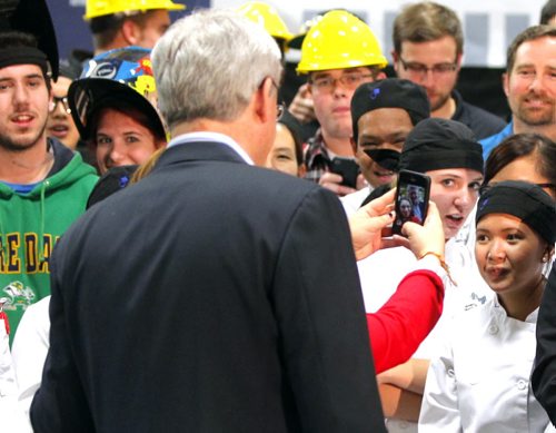 Prime Minister Stephen Harper at photo opportunity at Manitoba Institute of Trades and Technology  Henlow Campus, 130 Henlow Bay. He gets a selfie taken by a person in the crowd. BORIS MINKEVICH / WINNIPEG FREE PRESS October 10, 2014