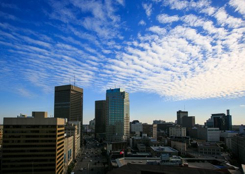 Clouds over Portage and Main. For City Beautiful book 140915 - Monday, September 15, 2014 - (Melissa Tait / Winnipeg Free Press)