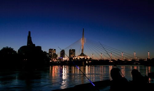 Fishing on the Red River at sunset. For City Beautiful book 140901 - Monday, September 01, 2014 - (Melissa Tait / Winnipeg Free Press)