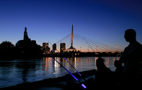 Fishing on the Red River at sunset. For City Beautiful book 140901 - Monday, September 01, 2014 - (Melissa Tait / Winnipeg Free Press)