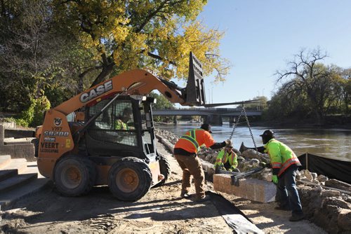 The River walk along the Assiniboine undergoes some reinforcements after a summer of high water caused damage to the shoreline and walkway.  Standup photo Oct 11,  2014 Ruth Bonneville / Winnipeg Free Press