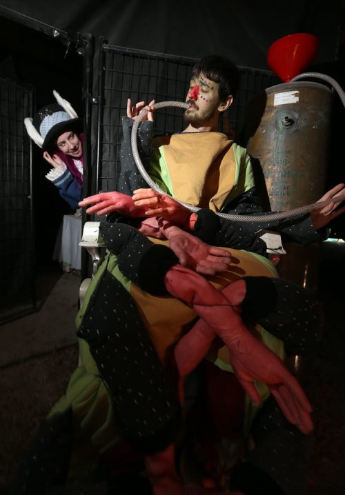 The White Rabbit (Taylor Driedger, 19) checks in on the Absolom the Caterpillar (Daniel Van Eerd) as he fuels up in the ÄòAlice In ZombielandÄô maze at Six Pines Haunted Attractions part north of Winnipeg on Sat., Oct. 11, 2014. The interactive attractions will be open until Halloween. Photo by Jason Halstead/Winnipeg Free Press