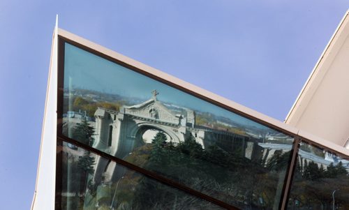 Old in New- A reflection of the St. Boniface Cathedral-Basilica Parish reflected in the Canadian Museum for Human Rights- Standup Photo- Oct 14, 2014   (JOE BRYKSA / WINNIPEG FREE PRESS)