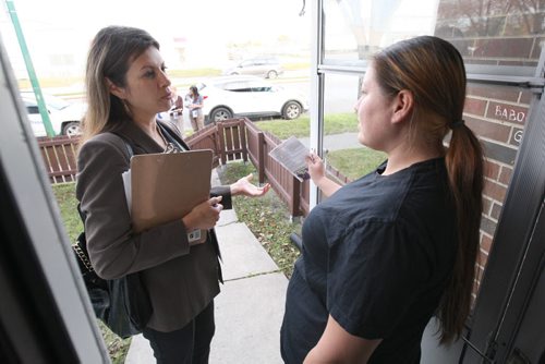 Point Douglas council candidate Rebecca Chartrand talks Kirstin Rominuk, 32 years who has never voted in her constituency See Mary Agnes Welch and Bartley Kives stories- Oct 14, 2014   (JOE BRYKSA / WINNIPEG FREE PRESS)