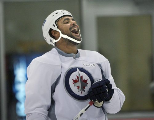 Winnipeg Jets Dustin Byfuglien has a laugh during the teams practice Wednesday at the MTS Iceplex-The Jets are in preparation for their home opener this Friday against the Nashville PredatorsSee Tim Campbell story- Oct 15, 2014   (JOE BRYKSA / WINNIPEG FREE PRESS)
