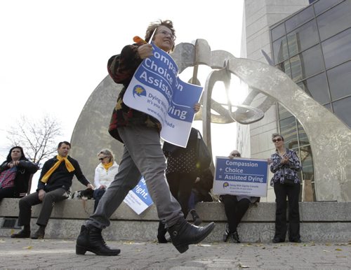 Jill Moats participated in the rally that was held in front of the Law Courts at noon Wednesday as of the part of the Dying With Dignity Canada that is holding rallies across Canada to support doctor-assisted suicide. Carol Sanders story Wayne Glowacki/Winnipeg Free Press Oct. 15 2014
