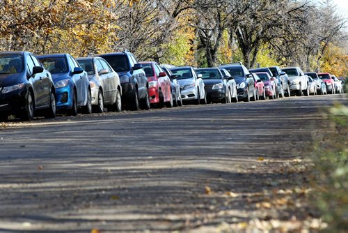 Students park their cars along Markham street near the U of M to avoid parking fees.  U of M Russell Room on second floor of University Centre holds open house on campus plan, updating people on future use of the former Southwoods golf course lands with special attention to the view of the campus from Pembina Hwy. Oct 11,  2014 Ruth Bonneville / Winnipeg Free Press