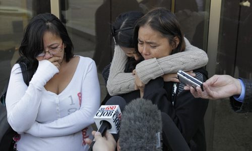 After the court case for the  sentencing of Nicholas Abraham, 25, and Jonathon Starr, 32,  at right Lana Fontaine sister of victim Eugene Fontaine with family members speak to media outside the Law Court . Mike McIntyre story.  Wayne Glowacki/Winnipeg Free Press Oct. 15 2014
