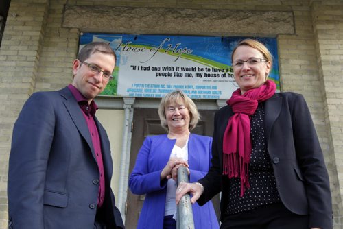 Philanthropy page on "A Port in the Storm" a charitable organization which works like a Ronald McDonald house for adults. David Szwajcer, Pat Benjaminson, and Stacey Grocholski pose for a photo in front of 210 Masson, future home of it.   BORIS MINKEVICH / WINNIPEG FREE PRESS October 15, 2014