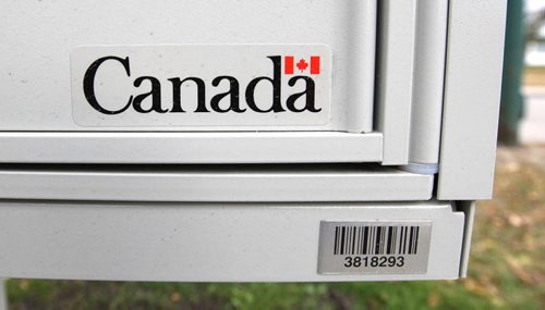 Canada sticker on super mailbox of Jefferson Ave - Oct 17, 2014  (JOE BRYKSA / WINNIPEG FREE PRESS)