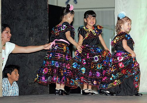 BORIS MINKEVICH / WINNIPEG FREE PRESS  070807 Folklorama- Mexico. The Mexican Pavilion. Various dancers perform the evening shows. A little push and some showbiz jitters just before they started dancing.