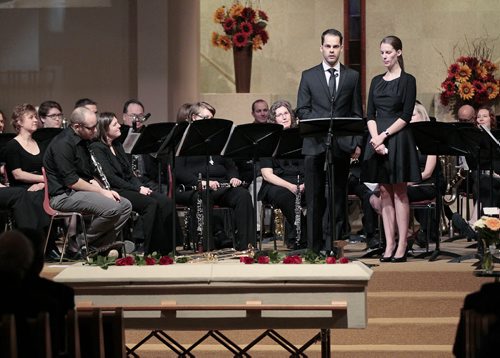 October 19, 2014 - 141019  -  Jeremy and Karly Epp speak at the funeral of their father Ken Epp, who helped grow music education in the province during his 29 years as Executive Director of the Manitoba Band Association at North Kildonan MB Church Sunday, October 19, 2014. The band was comprised of band teachers, members of various local bands and former students.  John Woods / Winnipeg Free Press