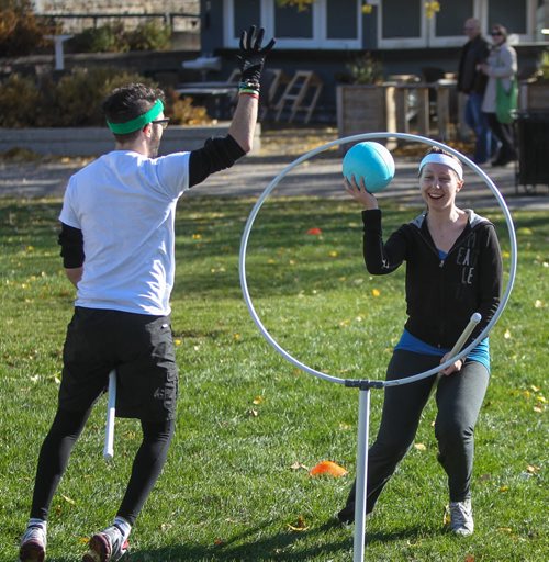 Members of the Winnipeg Whomping Willows Quidditch team Renata Hrymdzio (right) and Jason Rosenberg (left) take part in an open practice at The Forks in an effort to drum up interest in the game. 141019 - Sunday, October 19, 2014 -  (MIKE DEAL / WINNIPEG FREE PRESS)