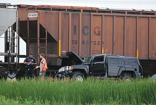 BORIS MINKEVICH / WINNIPEG FREE PRESS  070808 Hummer vs. Train Harstone Rd. and Wilks Ave. on the CNR rail line. At least 1 taken to hospital.