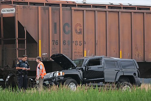 BORIS MINKEVICH / WINNIPEG FREE PRESS  070808 Hummer vs. Train Harstone Rd. and Wilks Ave. on the CNR rail line. At least 1 taken to hospital.