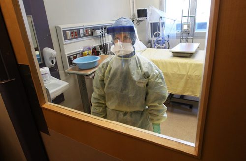 Health Sciences Centre demonstrated it preparedness plan for treatment of Ebola virus disease in Manitoba Monday afternoon.  Infection Control Professional nurse Lori Fleetwood shows personal protective equipment that will be used  a 1 of 10 isolation rooms to treat patients and protect workers in managing a suspected case of Ebola virus disease.See Larry Kusch story - Oct 20, 2014   (JOE BRYKSA / WINNIPEG FREE PRESS)