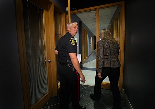 Constable Eric Hofley makes his way out of the press conference after making grim announcement to the media at PSB about the remains of 4 infant babies being found in a storage locker at in Winnipeg Tuesday morning.   Oct 21,  2014 Ruth Bonneville / Winnipeg Free Press