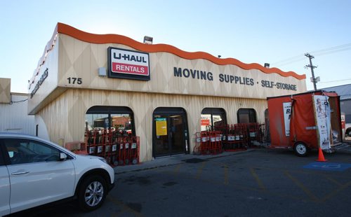 Workers were outside the U-Haul storage lockers at Elgin Ave and McPhillips on Tuesday- Winnipeg Police said they were called to a storage locker, after a worker discovered human remains of 3-4 babies on Monday afternoon- See Randy Turner story - Oct 21, 2014   (JOE BRYKSA / WINNIPEG FREE PRESS)