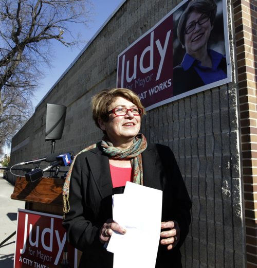 Mayoral candidate Judy Wasylycia-Leis outside her campaign office on Portage Ave. Tuesday for announcement for media. Bart Kives story. Wayne Glowacki / Winnipeg Free Press Oct. 21 2014