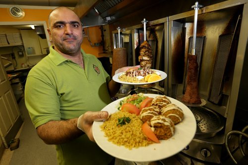 Raad Khamis, manager of Sultan Shawarma, Tuesday, October 21, 2014. (TREVOR HAGAN/WINNIPEG FREE PRESS)