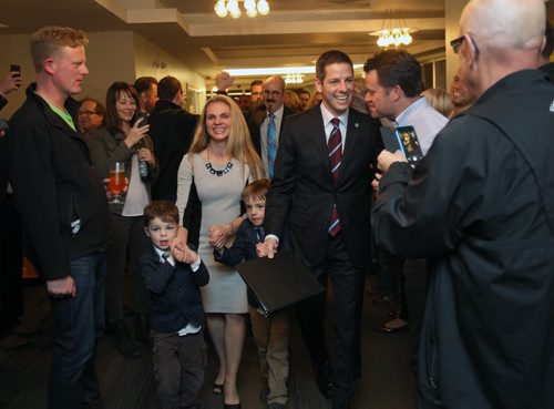 Brian Bowman the mayor elect of Winnipeg arrives  with his wife Tracy, and his two sons, Austin, left, and Hayden at his campaign headquarters at the Inn at the Forks in Winnipeg Wednesday night-See Aldo Santin story - Oct 22, 2014   (JOE BRYKSA / WINNIPEG FREE PRESS)