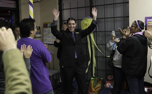 Mayoral candidate Robert-Falcon Ouellette is greeted by his supporters as he arrives at his HQ on election night. RRC student Jen Walichnowski/ story Wayne Glowacki/Winnipeg Free Press Oct.22  2014