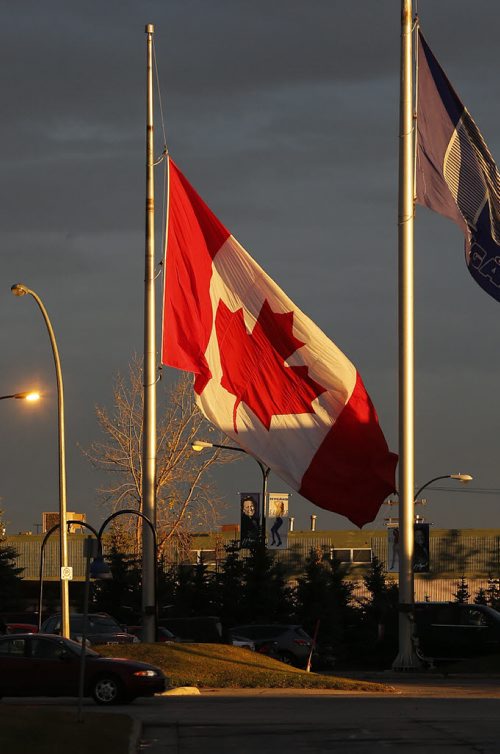 Stdup . Canadian flags are hanging at half staff  around the city as a result of the terror attack in Ottawa to honour  the  Canadian soldier Nathan Cirillo killed  Wednesday while guarding the National War Memorial .   Oct. 23 2014 / KEN GIGLIOTTI / WINNIPEG FREE PRESS
