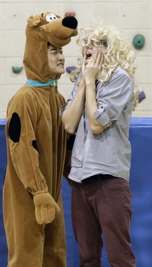 The Winnipeg Humane Society in partnership with the Pembina Trails School Division created the Trampers Story, it was performed for children at the Ryerson Elementary School Thursday. The 30-minute one-act play teaches the Humane Educational animal welfare curriculum to grades one to four in a creative and interactive way. At right  actor Dale Goodbrandson  in a scene with Galvin Niu as Kriss Kross.  Doug Speirs  story Wayne Glowacki/Winnipeg Free Press Oct.23  2014