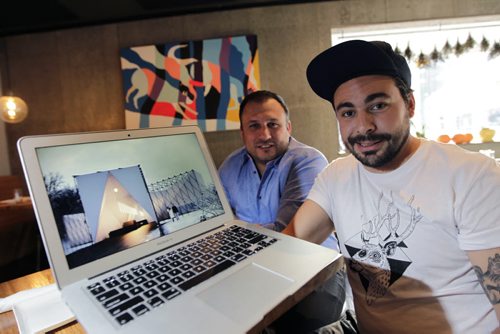 At right is Mandel Hitzer  with Joe Kalturnyk are co-directors of RAW:almond with an image of the RAW:almond 2015 winning  design by UK architects OS31. There's going to be a different look and feel to the restaurant on the river this coming January. Geoff Kirbyson story Wayne Glowacki/Winnipeg Free Press Oct.23  2014