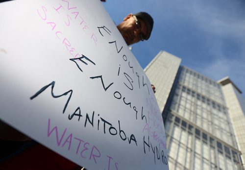 Pimicikamak residents demonstrate outside the Manitoba Hydro building in Winnipeg, one week after evicting Hydro from the Jenpeg dam, Thursday, October 23, 2014. (TREVOR HAGAN/WINNIPEG FREE PRESS)