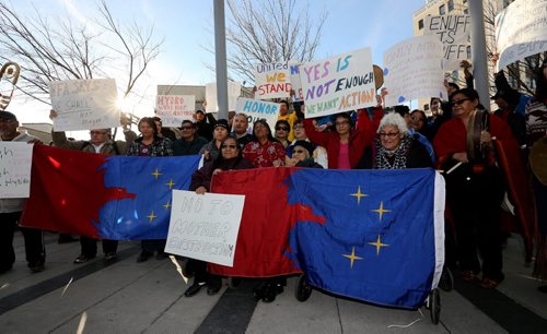 Pimicikamak residents demonstrate outside the Manitoba Hydro building in Winnipeg, one week after evicting Hydro from the Jenpeg dam, Thursday, October 23, 2014. (TREVOR HAGAN/WINNIPEG FREE PRESS)