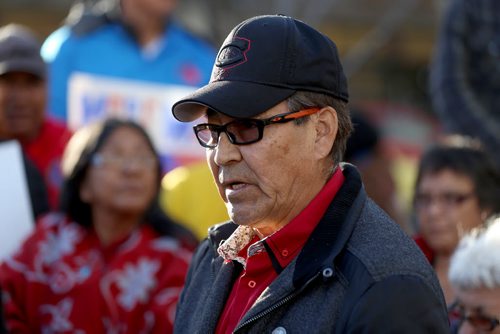 Member of the Executive council, Mervin Garrick speaking. Pimicikamak residents demonstrated outside the Manitoba Hydro building in Winnipeg, one week after evicting Hydro from the Jenpeg dam, Thursday, October 23, 2014. (TREVOR HAGAN/WINNIPEG FREE PRESS)