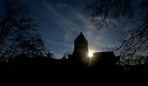 A partial solar eclipse seen at the Manitoba Legislative Building in Winnipeg, Thursday, October 23, 2014. (TREVOR HAGAN/WINNIPEG FREE PRESS)