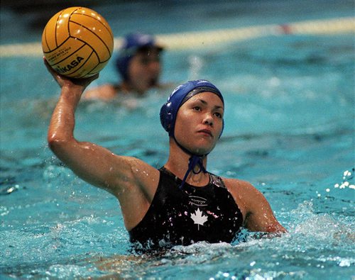 National water polo team member Waneek Horn-Miller gets set during a game in Winnipeg, Tuesday, May 24, 1999. Nine years after she was almost fatally stabbed by a soldier's bayonet during the infamous standoffin Quebec, Horn-Miller has become a symbol of native pride.(CP PHOTO/Winnipeg Free Press-Jeff De Booy)