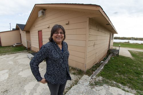 Annie Ballantyne, principle at the Grand Rapids School, stands outside the former teacher residences, they are now classrooms in Grand Rapids, MB. 140930 - Friday, September 24, 2014 -  (MIKE DEAL / WINNIPEG FREE PRESS)