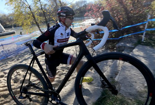 A participant in the Junior and Under 23 category at the Canadian Cyclocross Championships on a course around The Forks, Saturday, October 25, 2014. (TREVOR HAGAN/WINNIPEG FREE PRESS)