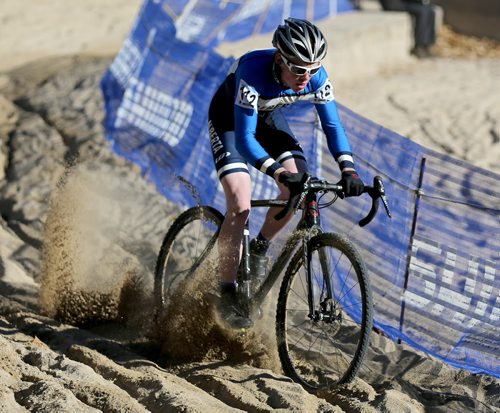 A participant in the Junior and Under 23 category at the Canadian Cyclocross Championships on a course around The Forks, Saturday, October 25, 2014. (TREVOR HAGAN/WINNIPEG FREE PRESS)